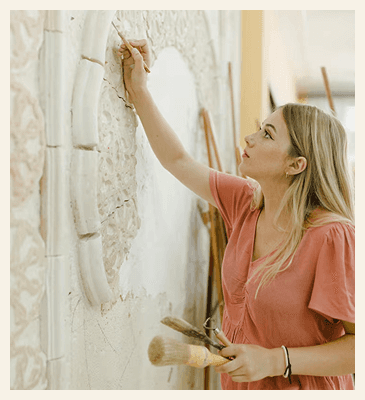 Girl decorating facade